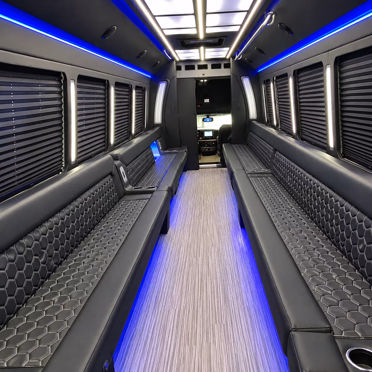 Group beside a Mercedes Sprinter limo in West Palm Beach